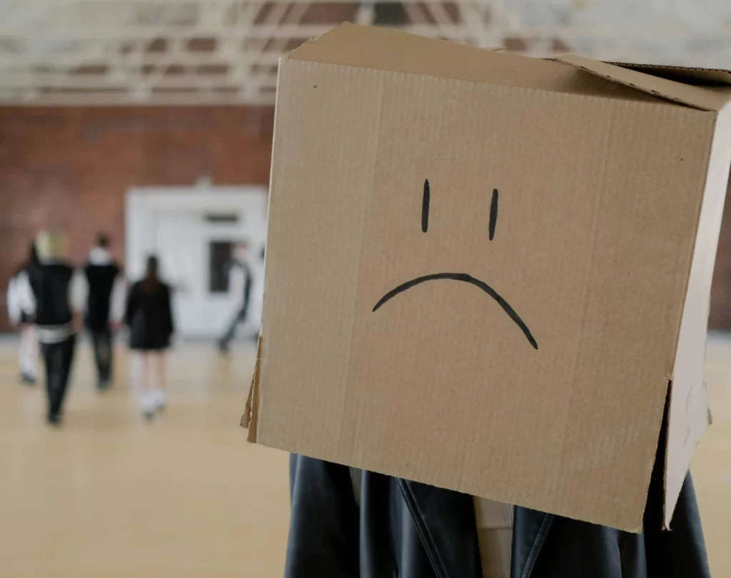 a person with a cardboard box on their head